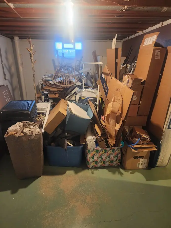 Roll-off dumpster container at job site for Construction Dumpster Rental in Smithfield